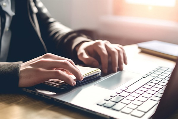 What is the process of purchasing a top-level domain name?