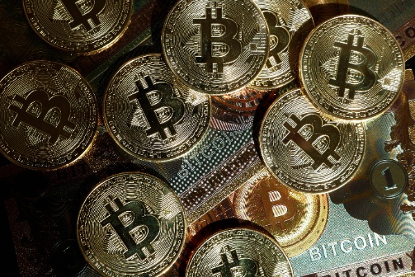 What makes Bitcoin a new type of currency?