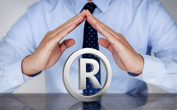 Why do companies unify trademarks,business names and domain names?