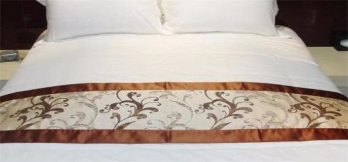 酒店床上的布条干什么用的