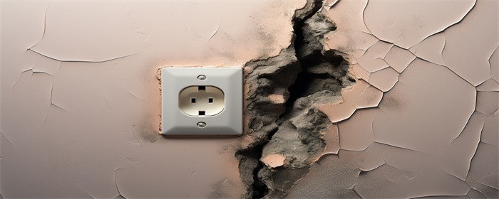 摄图网_600417021_建筑裂缝墙壁的电源插座(企业商用).jpg