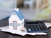 一般买房贷款首付额度是由哪些因素决定？